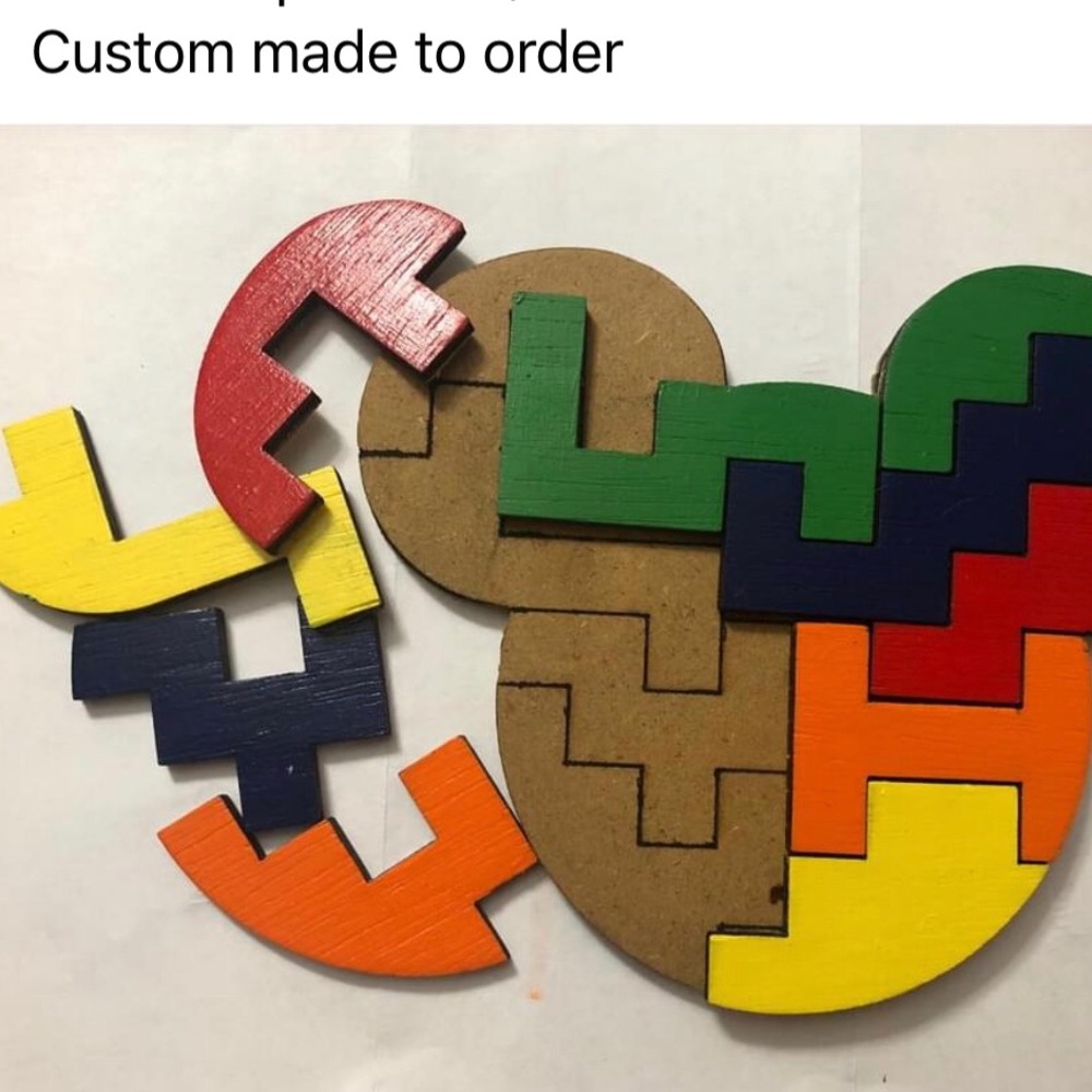 Hand made wood puzzle 9”x6”